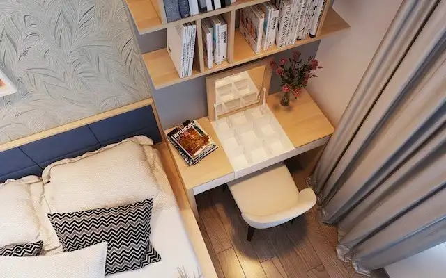 Bàn làm việc kê đầu giường giúp tiết kiệm không gian